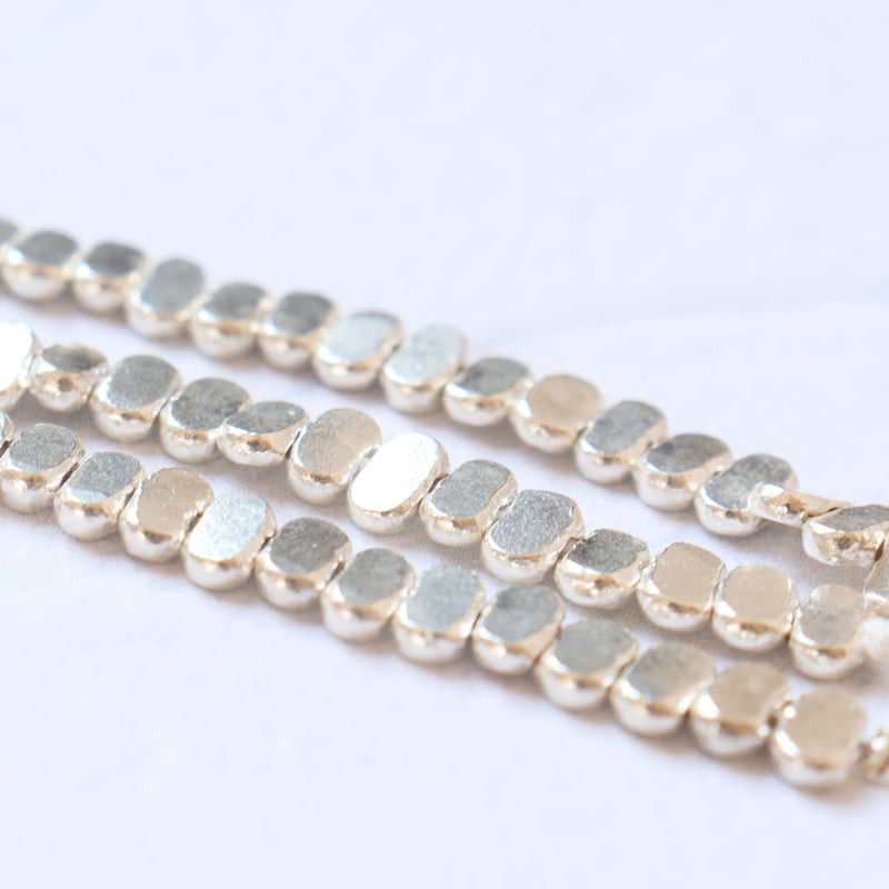 KB-057 カレンシルバー フラットオーバルビーズ | EREN gemstones