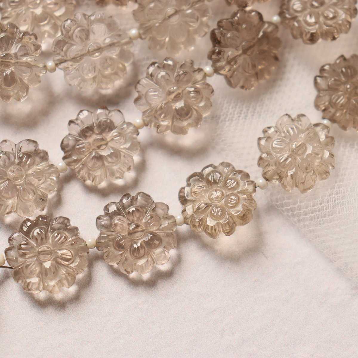 B-1002 スモーキークォーツ たんぽぽカービング半連 | EREN gemstones