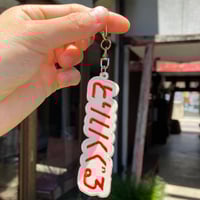 とりいくぐるキーホルダー （アイボリー×朱色）