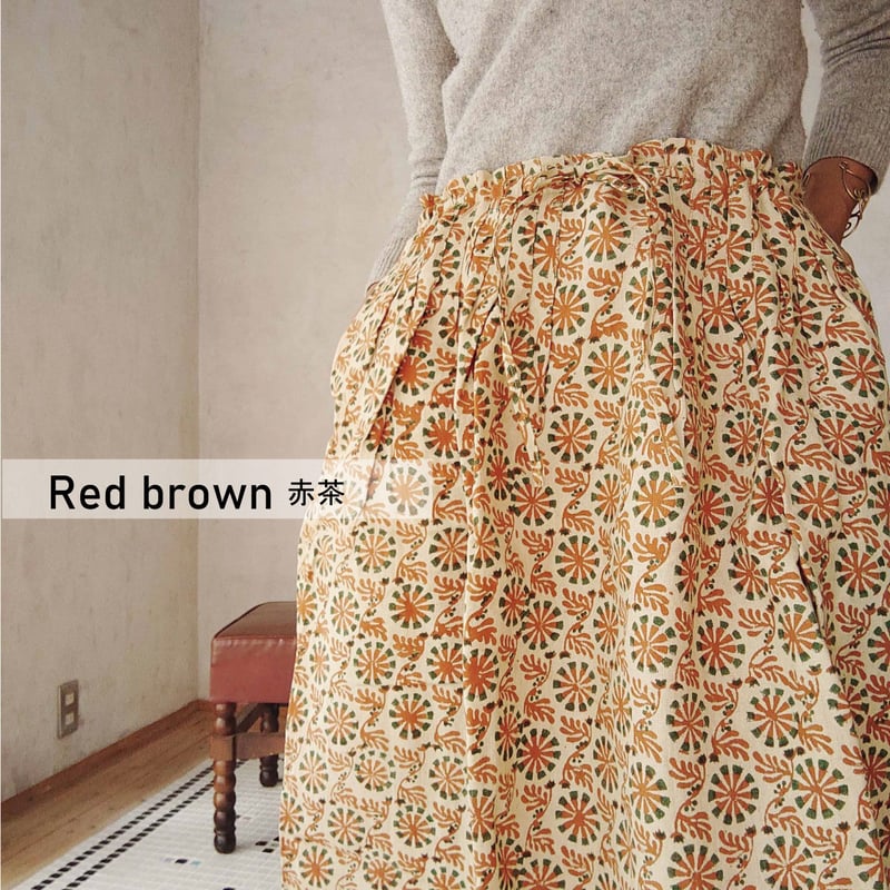 ピンタックスカートFree size「Mami Tsuji バグルー村の太陽の花