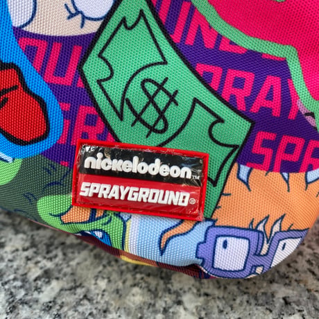 米国仕様 SPRAYGROUND ニコロデオン RUGRATS ラグラッツ スージー Susie バックパック (BKPK10)
