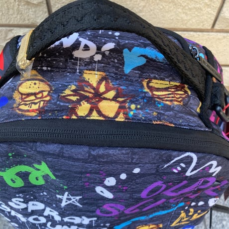 米国仕様 SPRAYGROUND ニコロデオン 90s Nick Toon テイクオーバー 落書き バックパック (BKPK8)