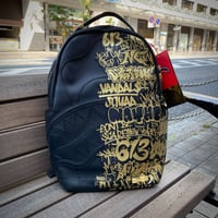 特別限定 SPRAYGROUND ハーフグラフィティ メタリック バックパック ビーガンレザー (BKPK69)