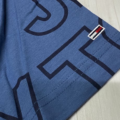 USAモデル TOMMY HILFIGER  TJ総柄 オールオーバーロゴ Tシャツ メリディアンレイク (R4F-25)