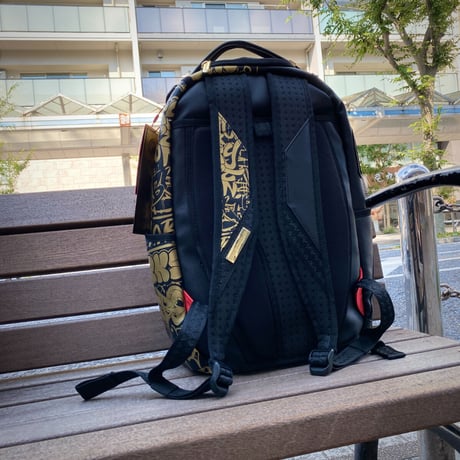 特別限定 SPRAYGROUND ハーフグラフィティ メタリック バックパック ビーガンレザー (BKPK69)