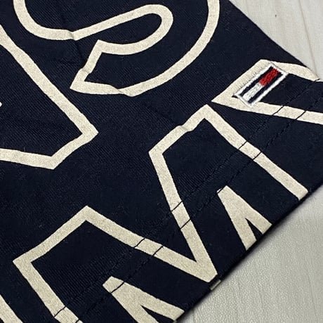 USAモデル TOMMY HILFIGER  TJ総柄 オールオーバーロゴ Tシャツ 紺 SkyCaptain (R4F-9)