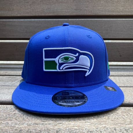 USA限定 9FIFTY ニューエラ NFL シーホークス SEA スナップバックキャップ 76-01 Throwback