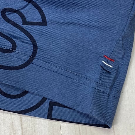 USAモデル TOMMY HILFIGER  TJ総柄 オールオーバーロゴ Tシャツ メリディアンレイク (R4F-25)