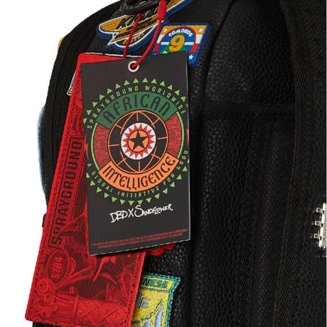 特別限定 SPRAYGROUND アフリカン インテリジェンス A.I. THE 54 PATCHES OF AFRICA カーゴバックパック