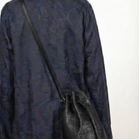 Hard shrink bucket shoulder bag