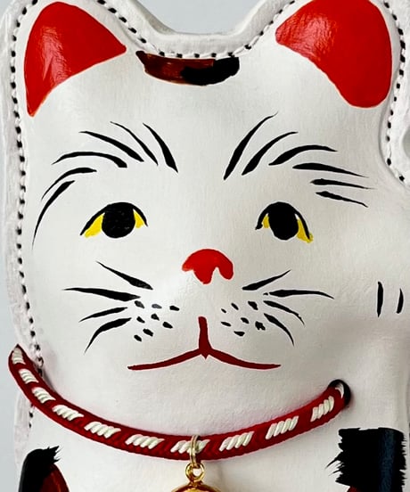 革の招き猫