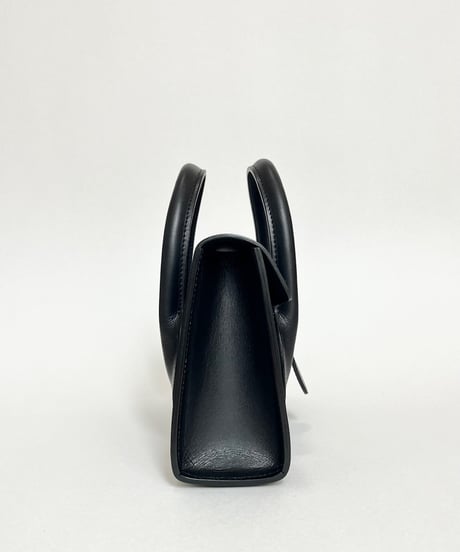 SHORT HANDLE HAND BAG “stoic”