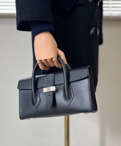 SHORT HANDLE HAND BAG “stoic”