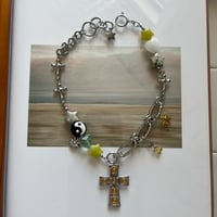 guru guru cross necklace