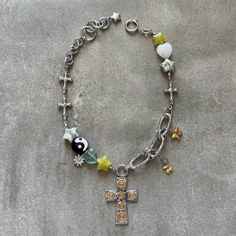guru guru cross necklace