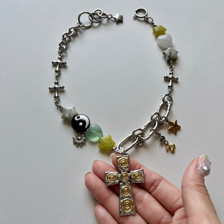guru guru cross necklace