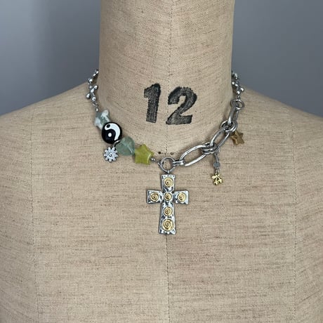 guru guru cross necklace