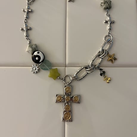 guru guru cross necklace