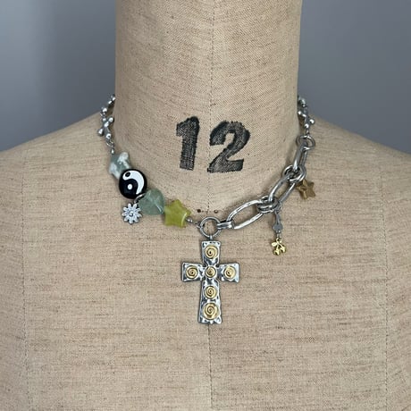 guru guru cross necklace