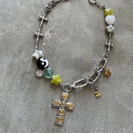 guru guru cross necklace