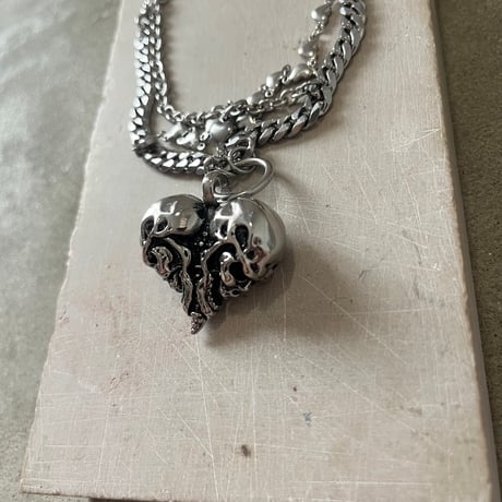 antique silver skull heart necklace