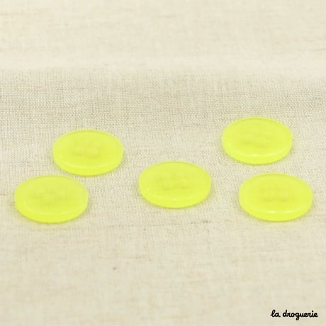 Bouton Fluo pion 4 trous translucide 15 mm