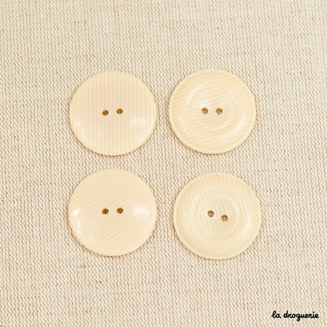 Bouton Grain de sable bord bombé 2 trous | Bouton 31mm