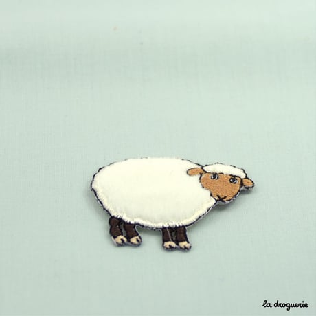 Ecusson « Mouton et sa fourrure »