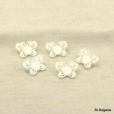 Bouton Envolée papillons ajourés 25 mm