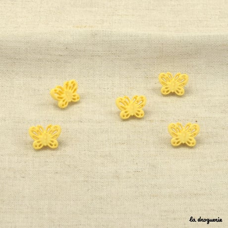 Bouton Envolée papillons ajourés 15 mm