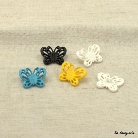Bouton Envolée papillons ajourés 25 mm