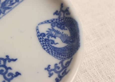 明治後期~大正銅判魚群と鳳凰に桐図小皿　窯傷,かたつき