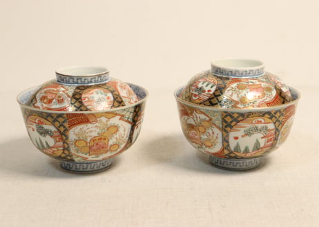 明治前期色絵桃に山水と鳥籠図通り物飯茶碗