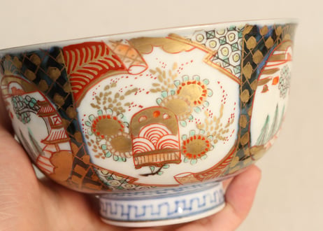 明治前期色絵桃に山水と鳥籠図通り物飯茶碗