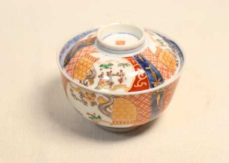 明治前期色絵梅と鶯に鳥籠図通り物飯茶碗