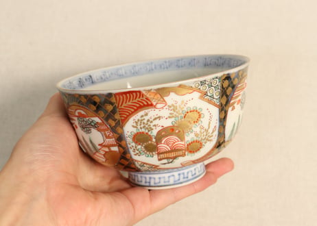 明治前期色絵桃に山水と鳥籠図通り物飯茶碗