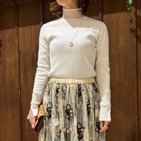 TRANOI.  メッシュネックトップス