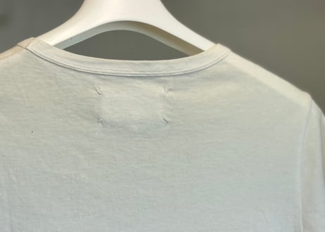 maison margiela calendar tag design tops