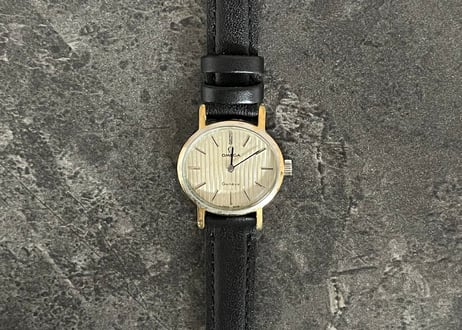 vintage omega "Genève" mechanical watch round