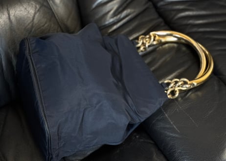 prada gold handle triangle logo bag