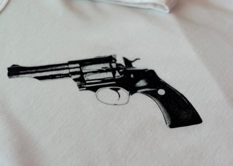 dolce & gabbana gun graphic tops