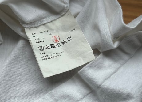 comme des garçons logo tops