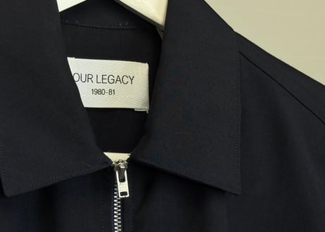 our legacy "初期タグ" compact jacket