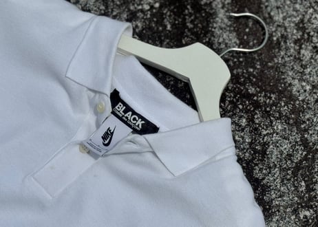 black comme des garcons nike logo polo shirt