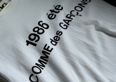 comme des garçons logo tops