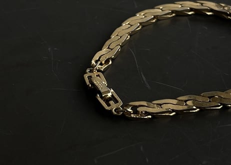 80-90s givenchy gold bracelet "E"