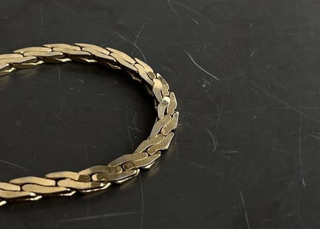 80-90s givenchy gold bracelet "E"