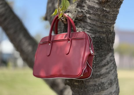 robe de chambre comme des garcons leather bag