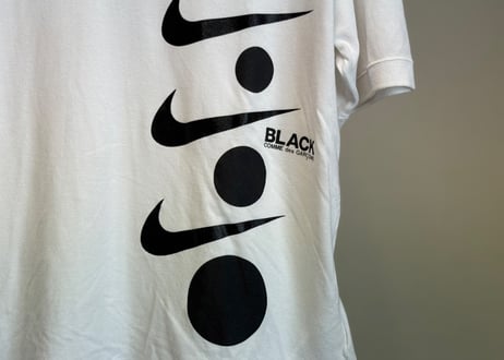 black comme des garcons nike logo polo shirt