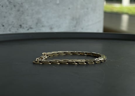 80-90s givenchy gold bracelet "E"